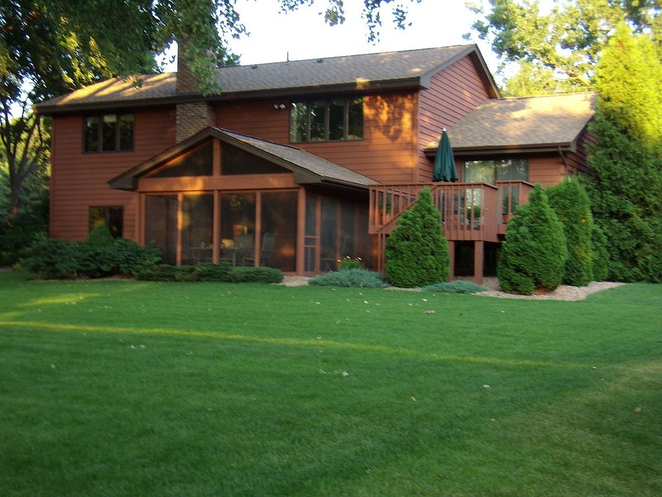 Lakeside view with porch and deck
