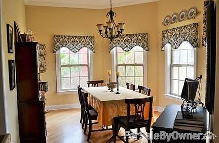 Formal Dining Room
						:
						Hardwood floors, crown molding
