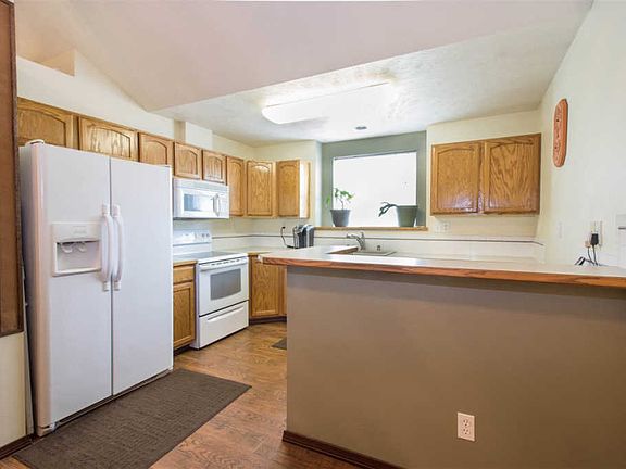 5th image of 10923 E 15th Ave