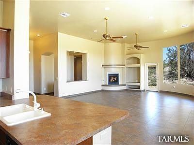 Great room has a gas fireplace and entertainment niche