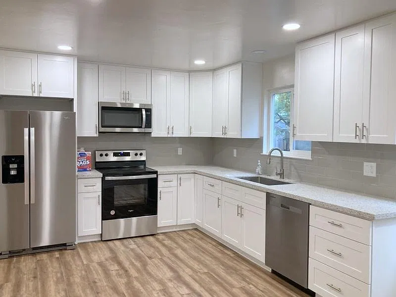 Large kitchen with dining area.