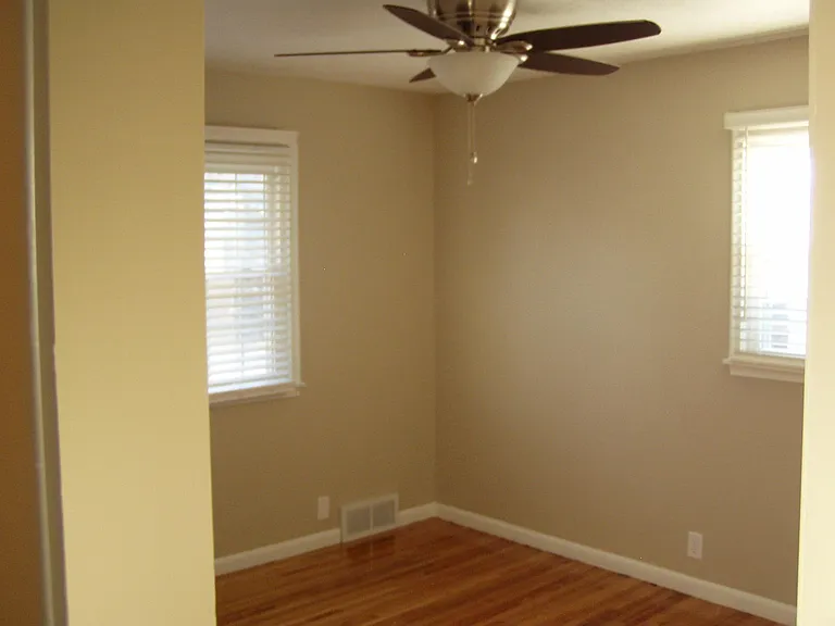 ALL BEDROOMS HAVE HARDWOOD FLOORS AND HUNTER CEILING FANS