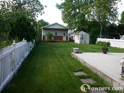 back yard facing garage