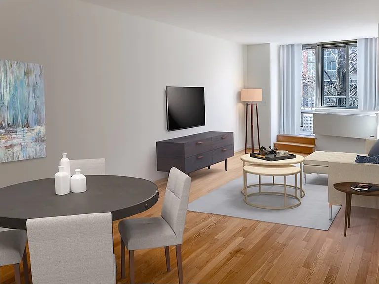 Classic Package dining and living areas with hard surface plank flooring