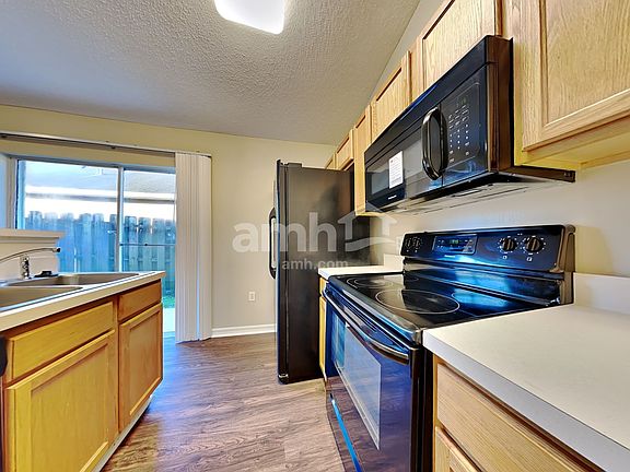3rd image of 6676 Gentle Oaks Dr W