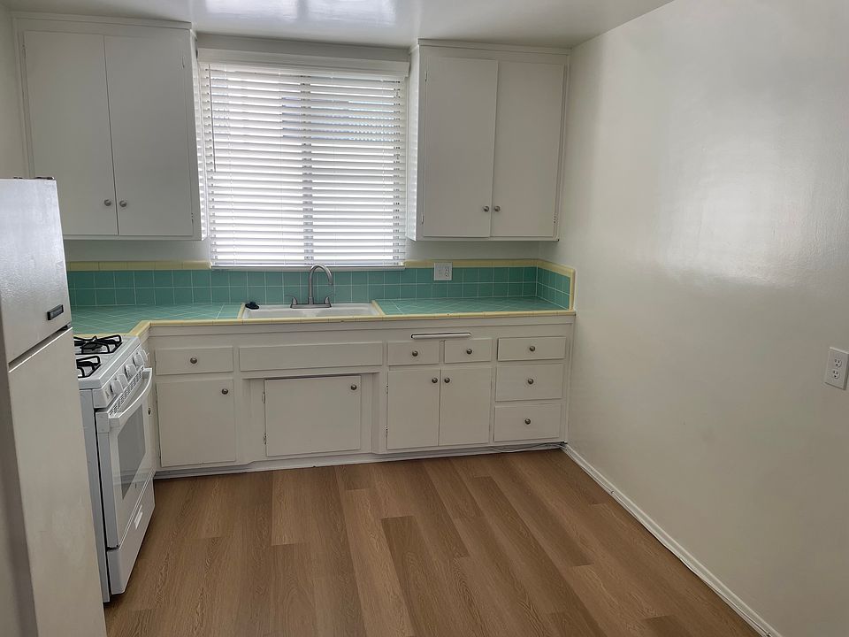 Kitchen large enough for small table & chairs.