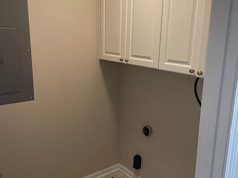 UPSTAIRS LAUNDRY ROOM.