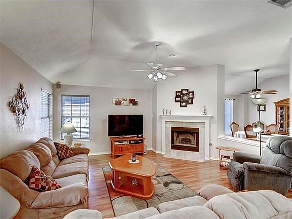 Your spacious living area features easy care pergo floors, fireplace and great windows allowing the natural light to shine in.  The open floor plan is perfect for entertaining when sharing those special meals with family and friends.