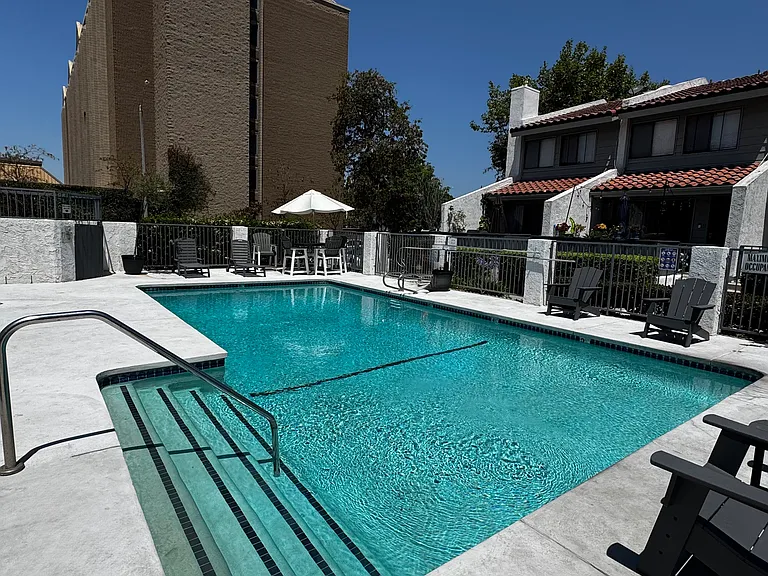 Recently updated pool deck with resort-style outdoor furniture