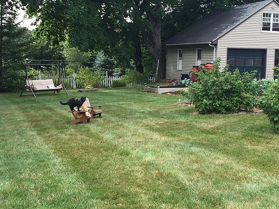 Adjoining landscaped lot with detached garaged SW