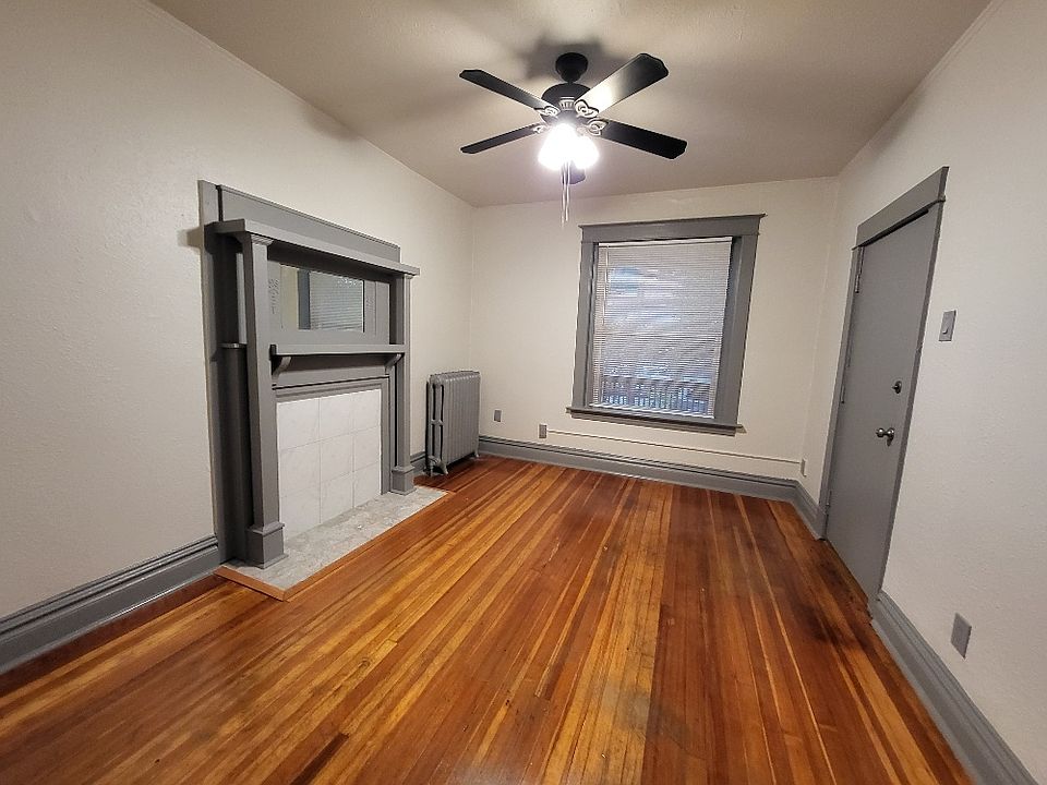 Hardwood floors and Vintage Mantle!