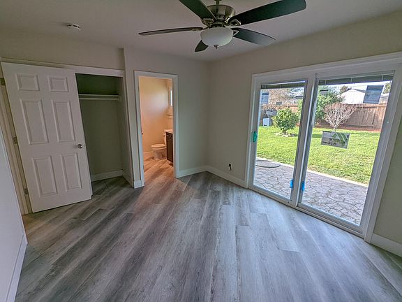 Master Bedroom with view into master bathroom