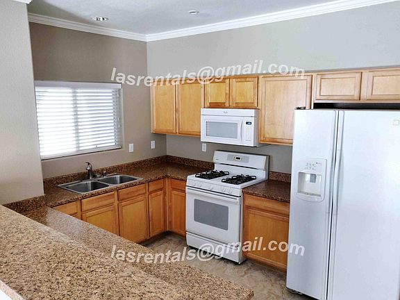Kitchen - New countertops, sink and lighting