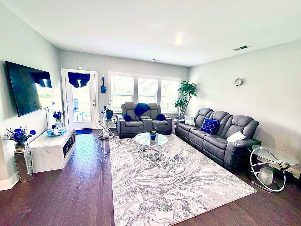 Living room with some of the comfiest couches you've ever sat on!