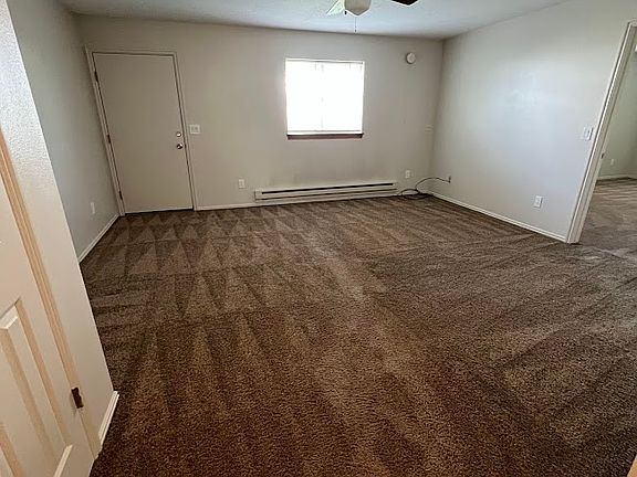 Entry looking at living room and back door.