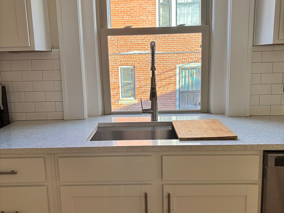 Deep sink with custom cutting board