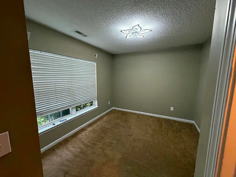 Bedroom 2, remote controlled ceiling fan, great for in-home office.