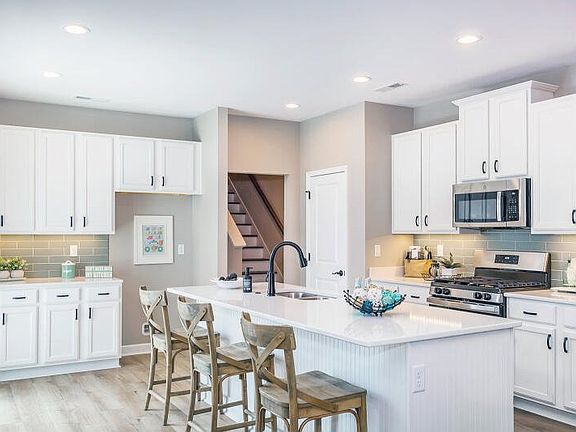 These photos are representative of this floor plan, but all options may not be available in every co