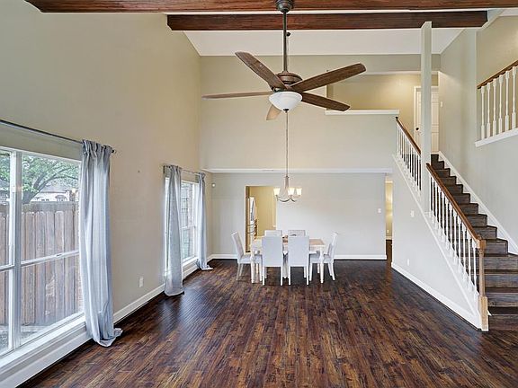 Enter into a formal living area and dining room