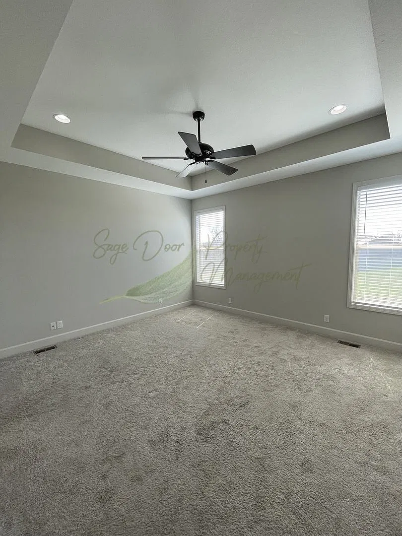 Spacious 4-Bedroom Home with Finished Basement — Photo 3