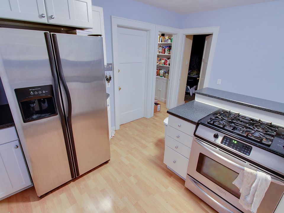 Kitchen with stainless steel appliances.