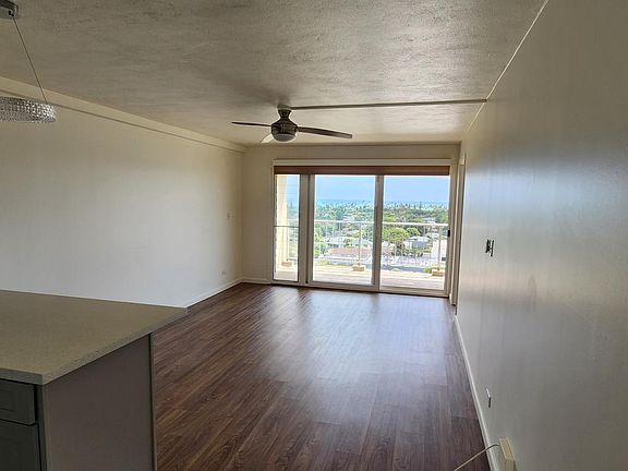 Living Room with Ocean View. Floor to Ceiling Sliders