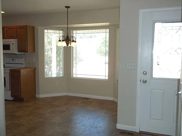 6936 Raleigh St — Photo 2