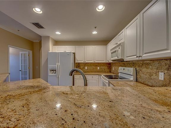 Granite tops and full granite backslash in the kitchen