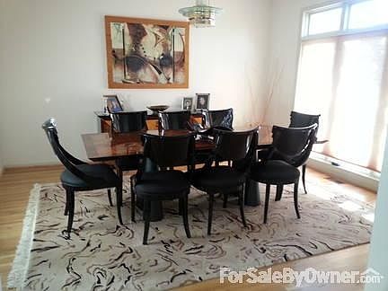 Dining Room
						:
						Wood Floors in Dining Room, Foyer and Living Room