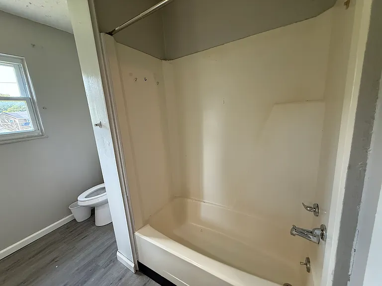 Master Suite showing bath and toilet