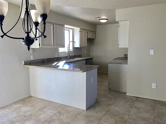 4th image of 8709 E 39th Pl