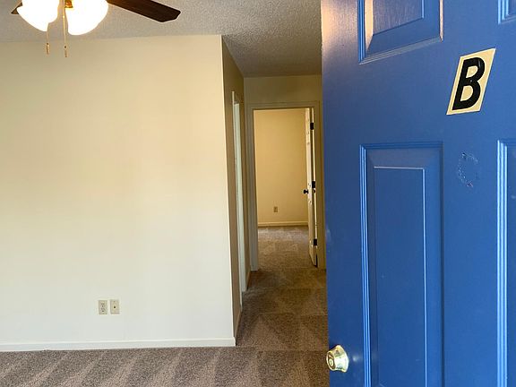 Brand new flooring and ceiling fans throughout.