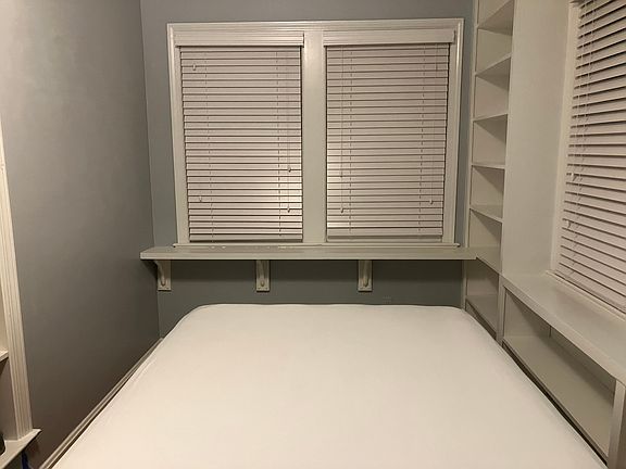 Bedroom with new gray paint
