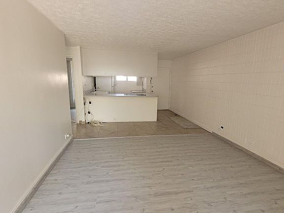 Living Room and Dining Area From Lanai