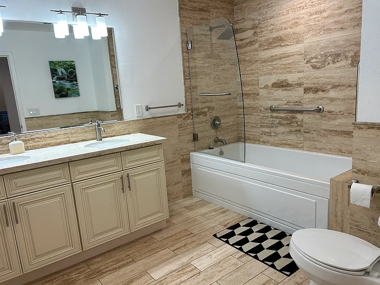 Master bathroom with a jacuzzi