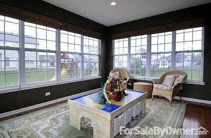 Large Sunroom!
						:
						Recessed lighting throughout - Overlooks large yard and playset!