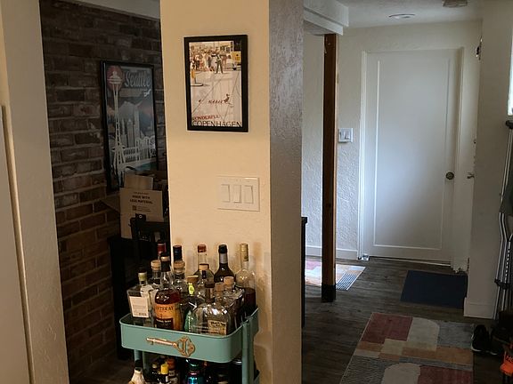 Entry hallway with natural brick wall