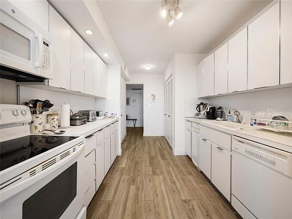 3rd image of 2 Grove Isle Dr #B402