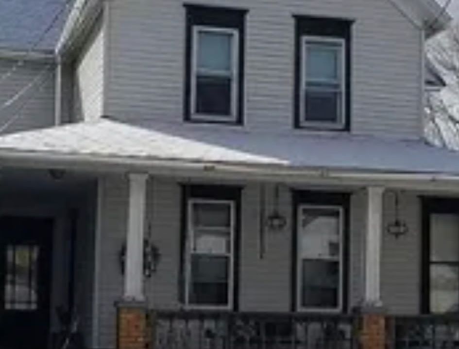 Front of house with large front porch