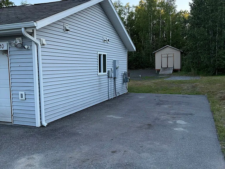 Driveway beside house