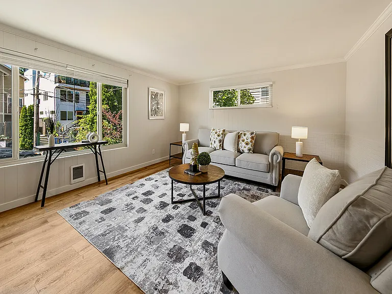 Large west-facing windows bathe the interior in natural light.