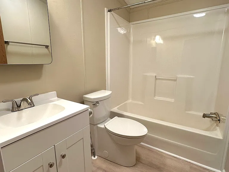 Hall bathroom with new vanity, mirror, stool and lights