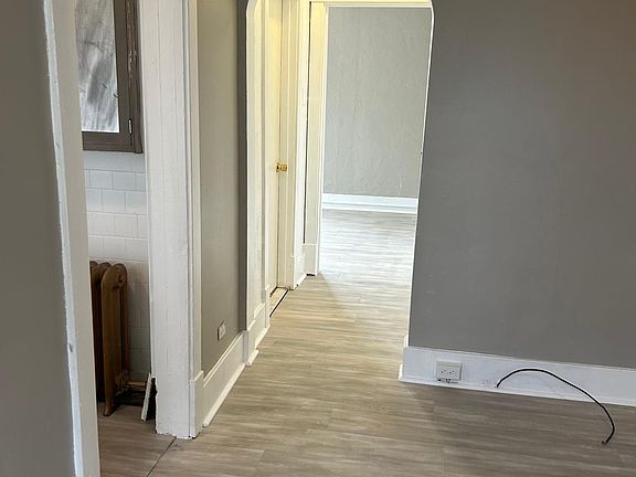 Another view of the Living Room that leads to the Kitchen. Hallway leads to the Closet, Bathroom, and Bedroom.