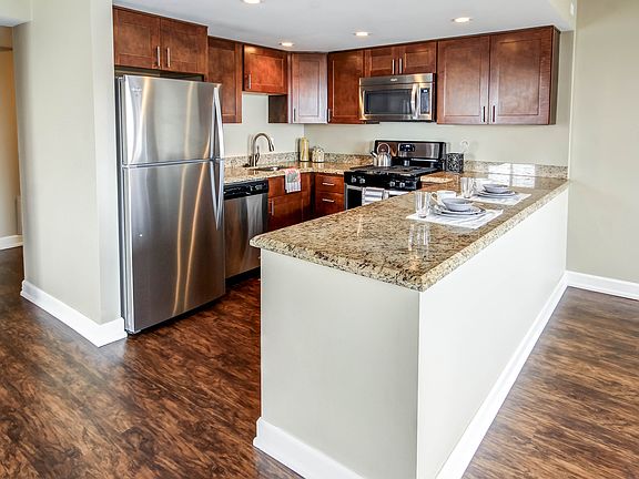 Upgraded Kitchens with granite, stainless steel and new cabinets in select units