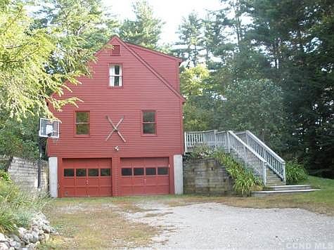 Up a long, private driveway sits this secluded well-maintained Cape