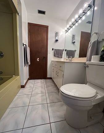 Full Bath with vanity shared by one other renter.