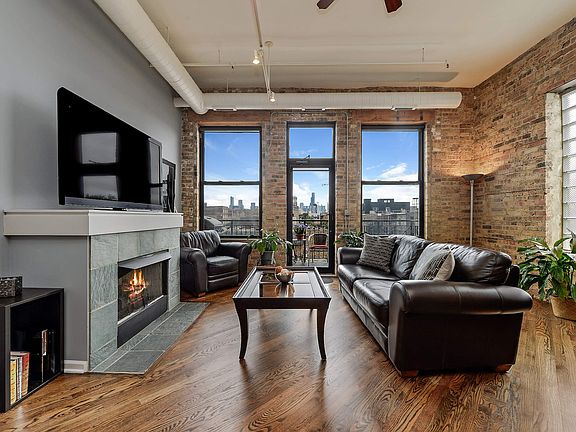 Living Room with Skyline View and Fireplace