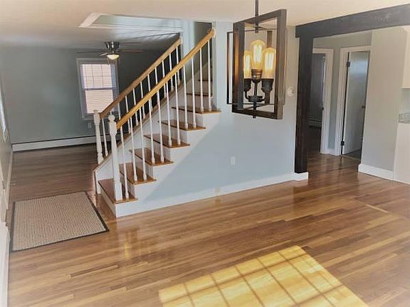 As you enter through the front door. Living room to the left/dining area to the right.