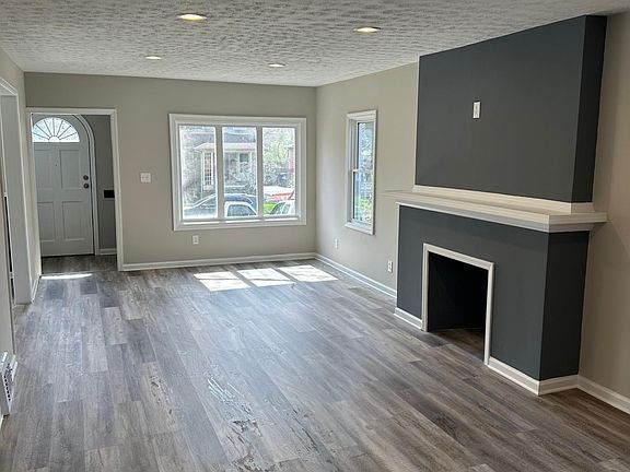 Oversized family room with luxury vinyl plank flooring