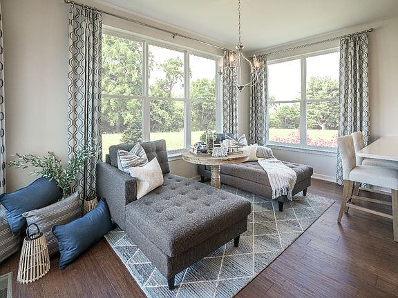 Natural light shines through the morning room and into the kitchen
